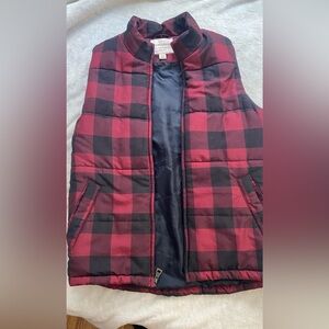 Weatherproof insulated red and black checkered vest.